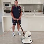 Tile and grout are power scrubbed to release the built-up dirt and grime.