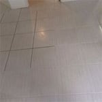 Before and after tile cleaning and grout re-colouring of floors.